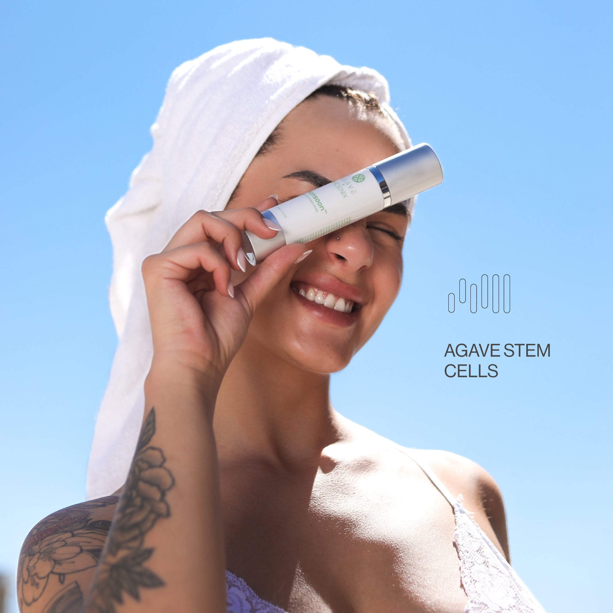 Model holding Monsoon Advanced Moisturizer — rich, nourishing skincare designed with agave stem cells.