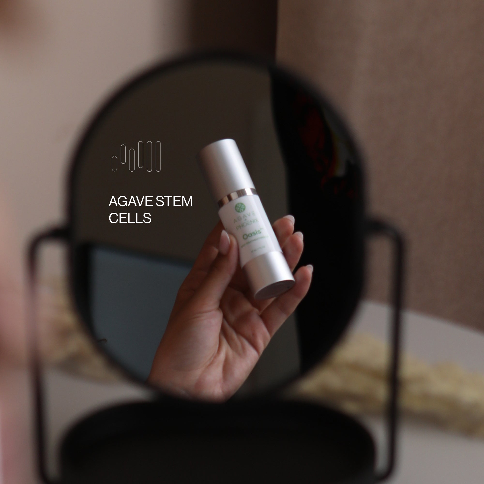 Oasis Spot Treatment held in hand with agave stem cells highlighting skin renewal